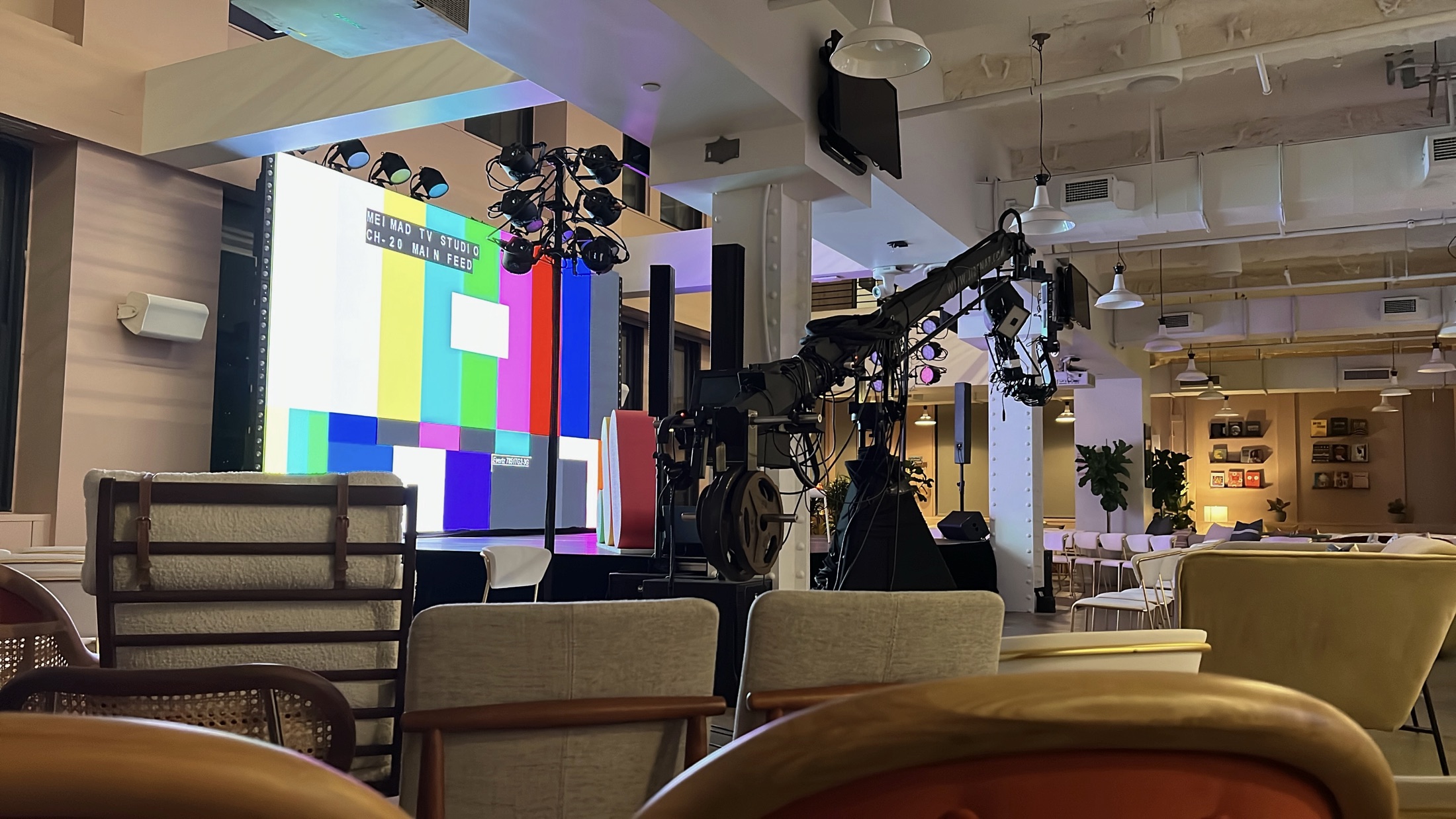 Camera crane, stage lighting and LED wall installed inside monday.com’s Manhattan office