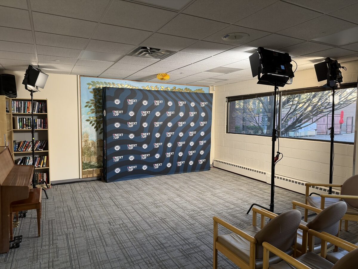 Step and repeat backdrop with lighting