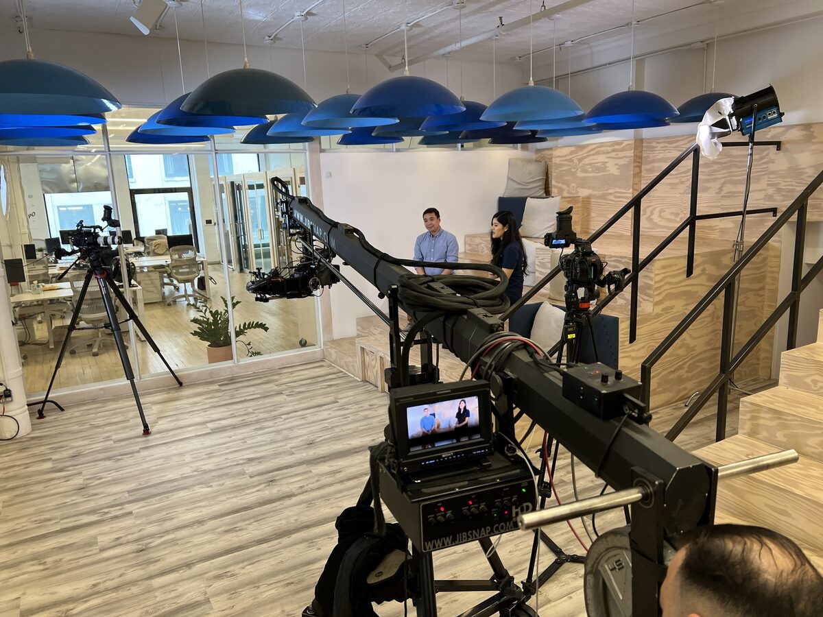 Jib crane filming in corporate office